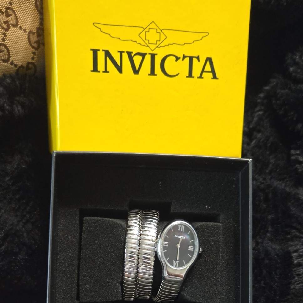 Invicta Black And Silver Timepiece